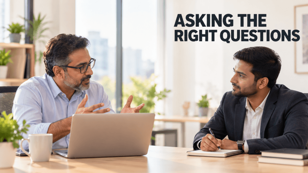 Business owner asking an IT consultant security questions across an office desk