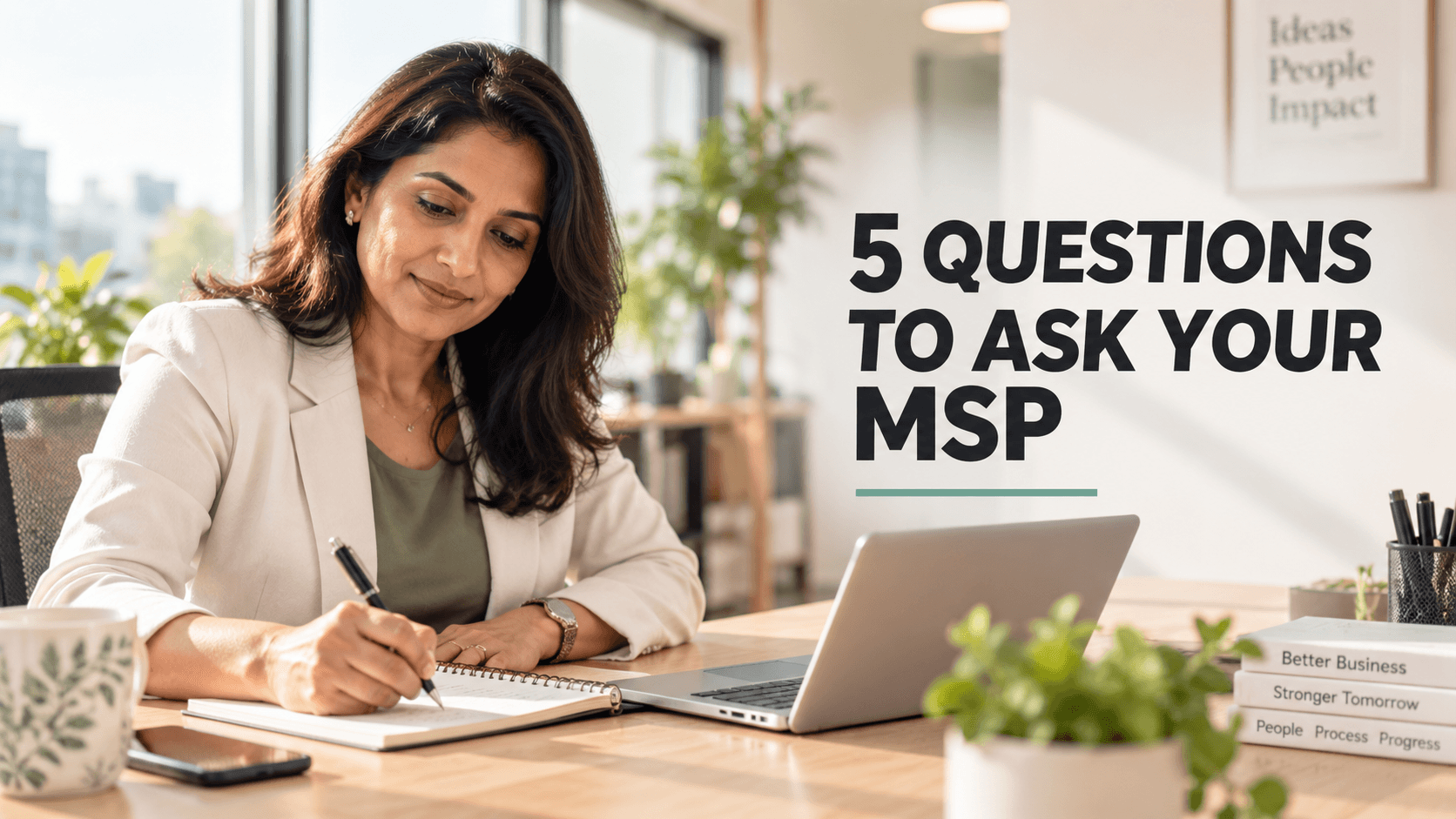 Home 37 Business owner reviewing the 5 questions to ask your MSP about security at her workplace desk